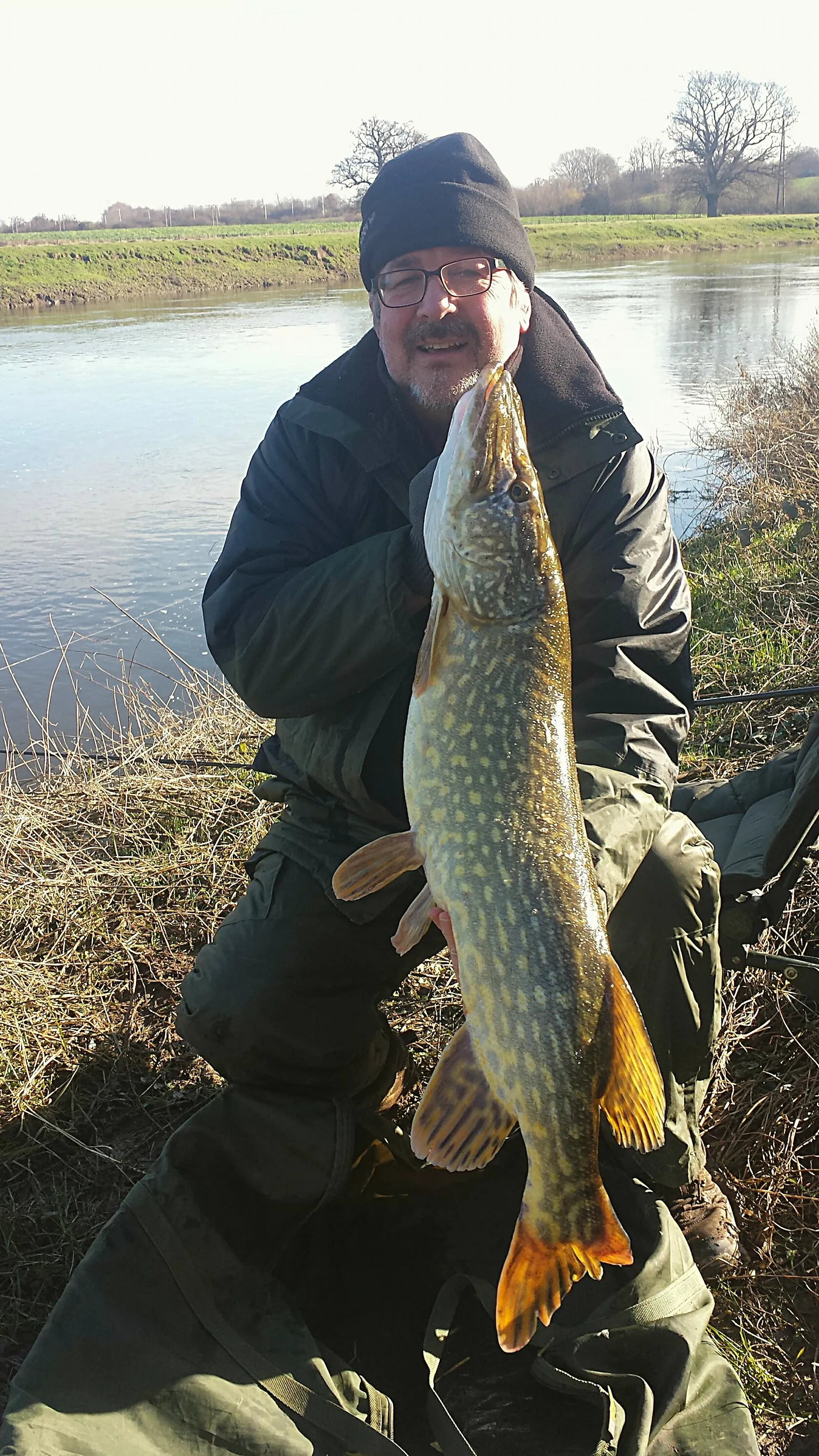 Chris Wood holding a 16lb pike
