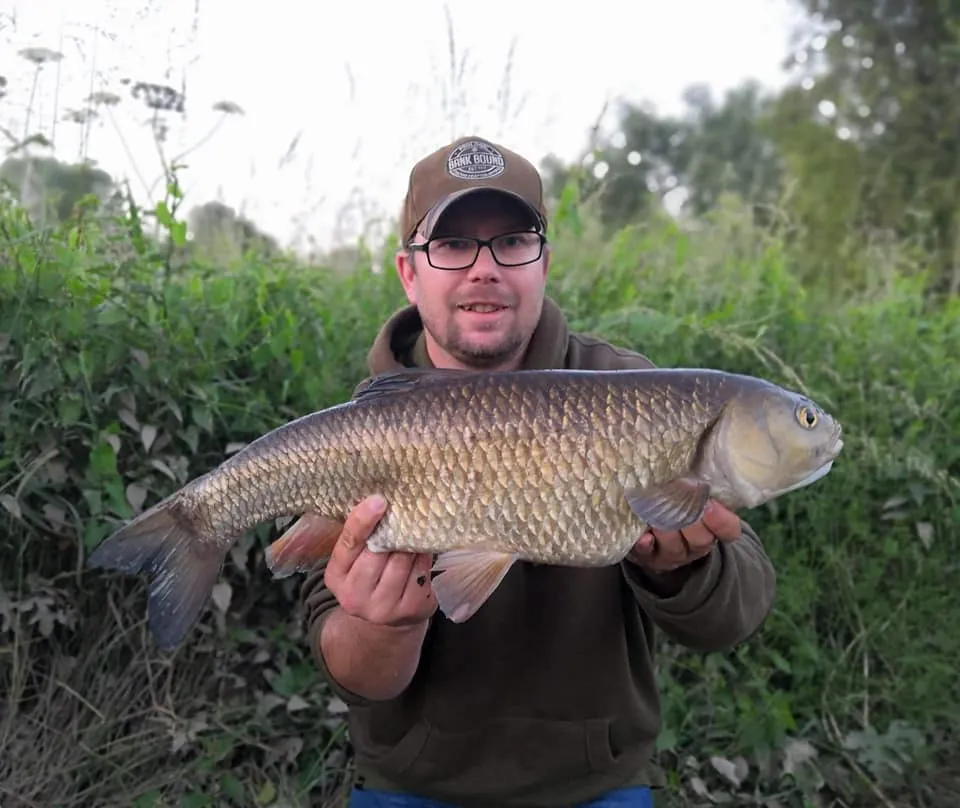 Ian Gregory holding his 7lb 1oz club record chub